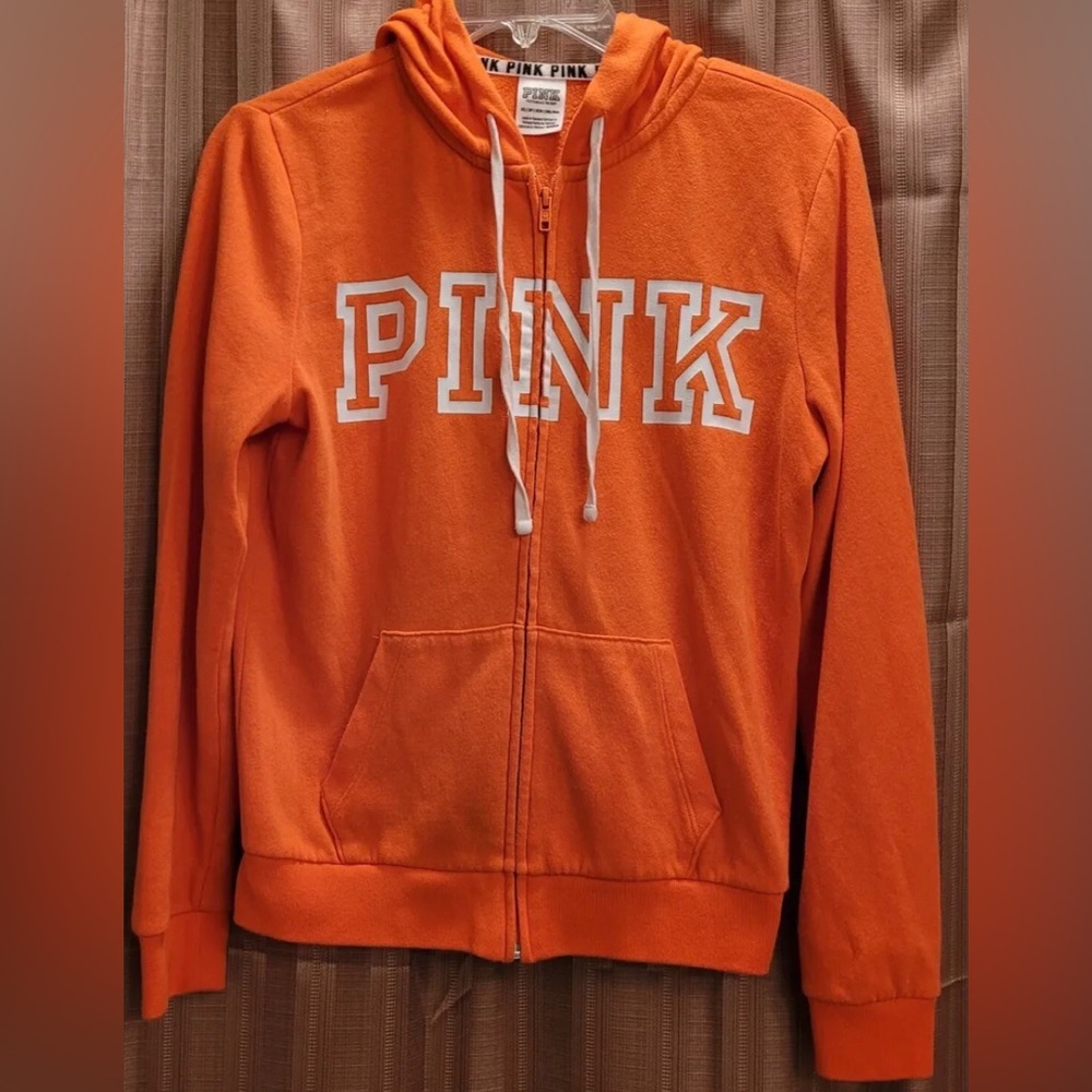 Victoria secrets, Love Pink ,Orange zip up hoodie with white ties! Size LG! EUC!